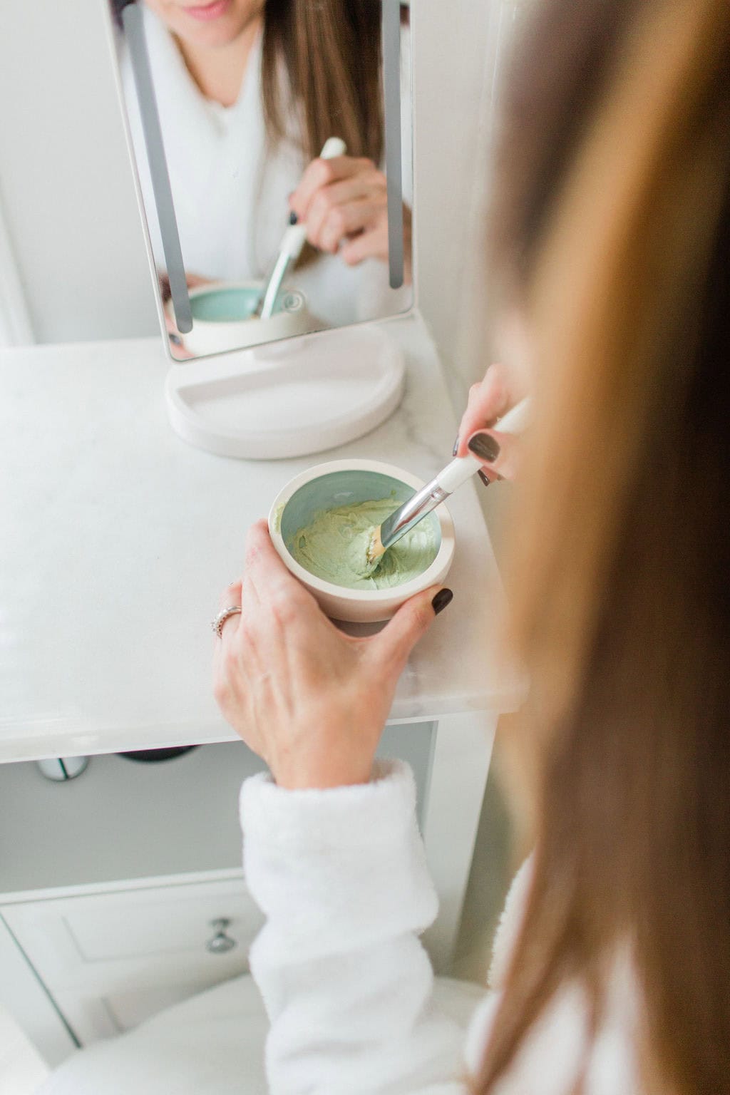 Mixing DIY manuka honey face mask for skincare routine