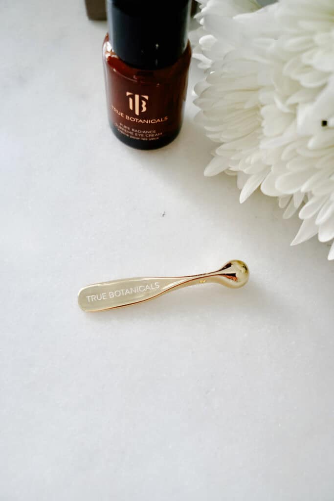 Eye cream tool on counter