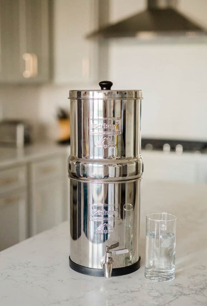 purified water poured into a glass after filtration process for safe drinking water