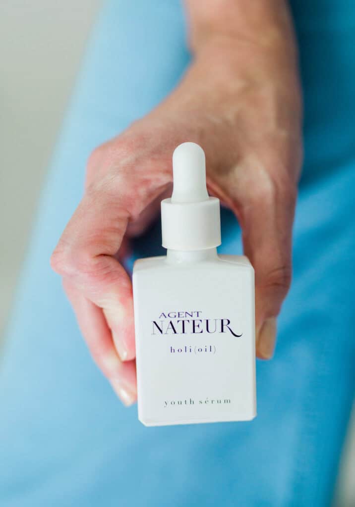 Holding a face oil before applying it