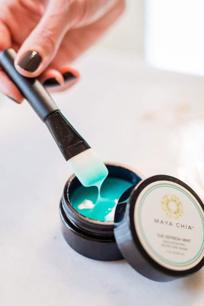 Applying a face mask from Maya Chia